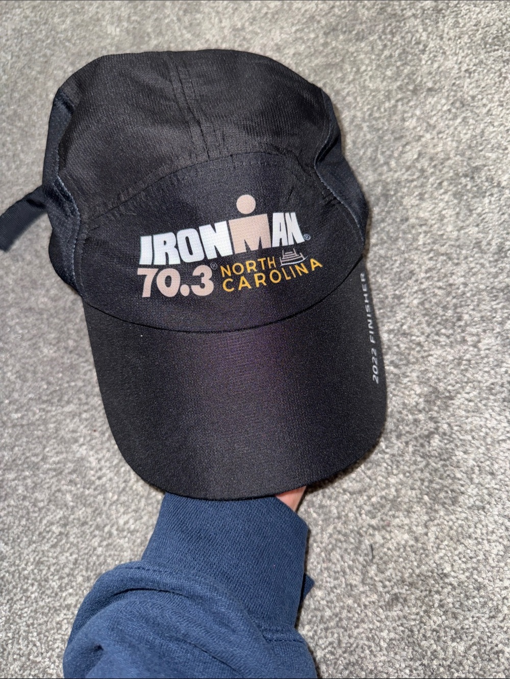 IRONMAN 70.3 North Carolina Black Performance Running Cap
